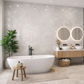 Clay White marble effect glossy porcelain tile 60x120cm with soft marble veining in a modern bathroom.
