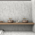 Frost Wood matt porcelain tile 60x120cm with light grey wood effect finish in a modern minimalist bathroom interior.
