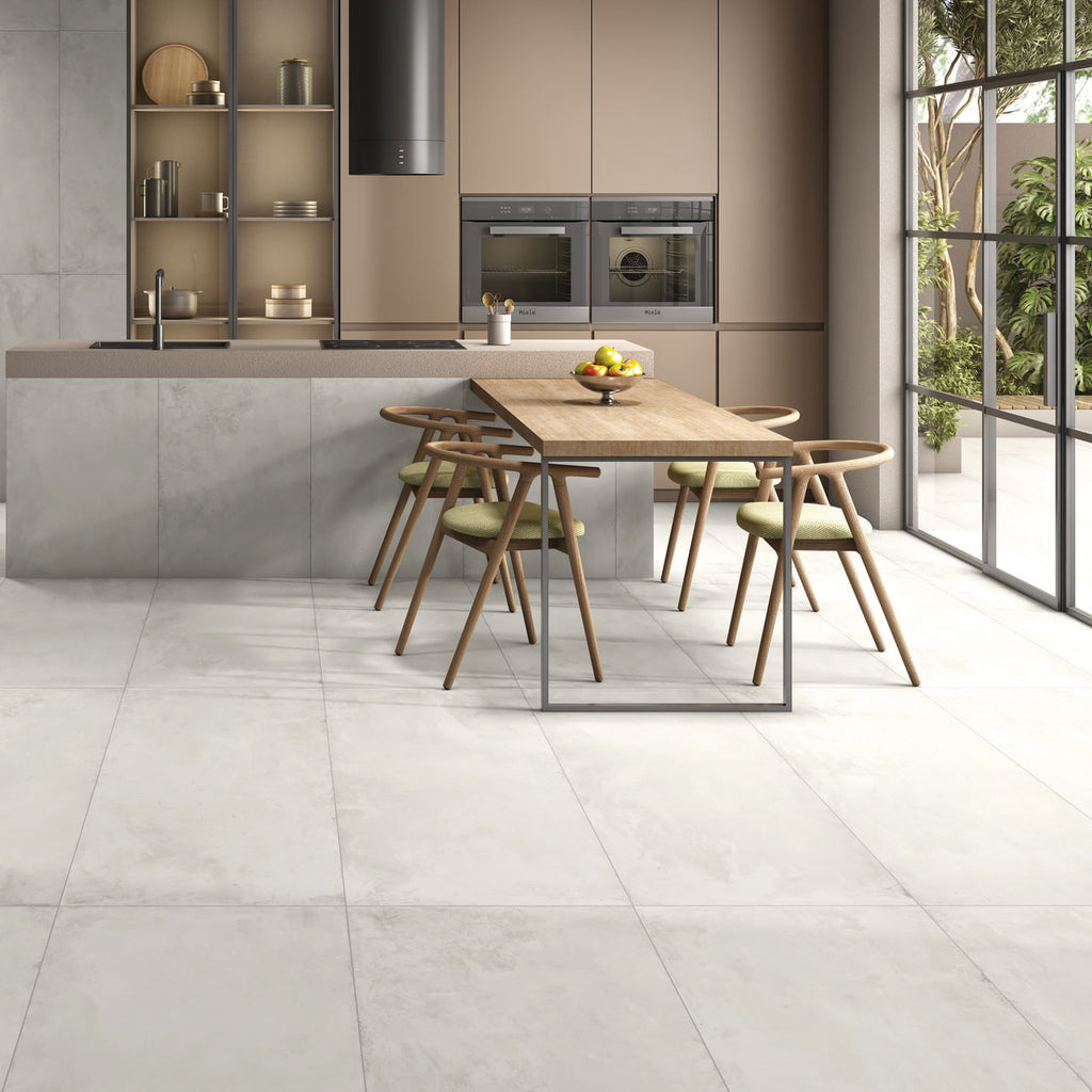 Royal Frost matt stone effect porcelain tile 60x120cm in a modern open-plan kitchen with soft grey/white tones