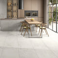 Royal Frost matt stone effect porcelain tile 60x120cm in a modern open-plan kitchen with soft grey/white tones