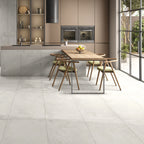 Royal Frost matt stone effect porcelain tile 60x120cm in a modern open-plan kitchen with soft grey/white tones