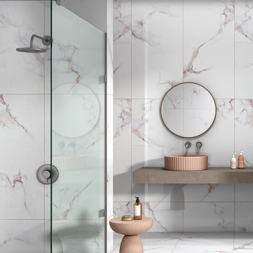 Snowflake Crystal glossy marble effect porcelain tile 60x120cm with soft white tones and subtle and striking veining in a modern luxury bathroom.