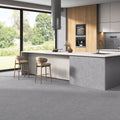 Stormy Horizon matt stone effect porcelain tile 60x120cm in a modern open-plan kitchen with layered grey tones.