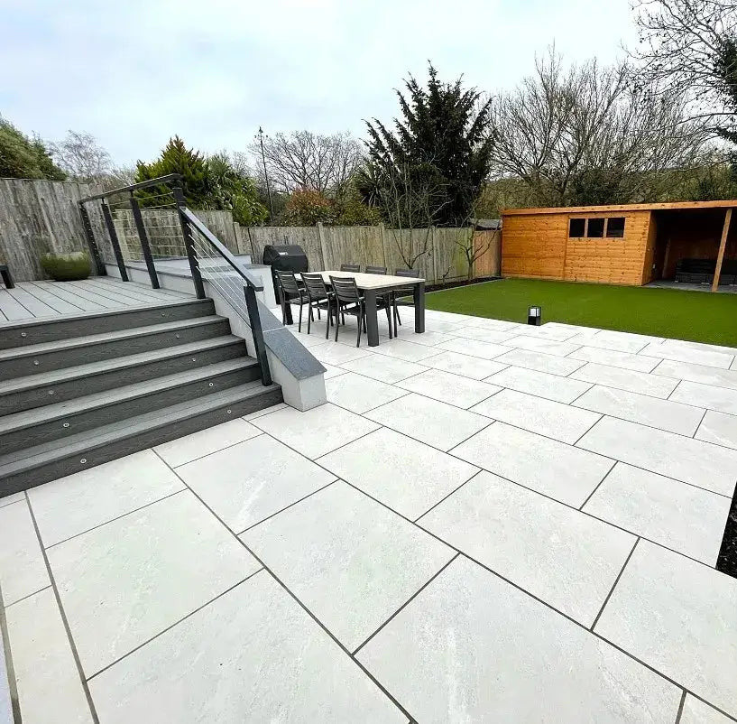 Alpine white veined outdoor porcelain paving tiles 900x600mm on bright patio