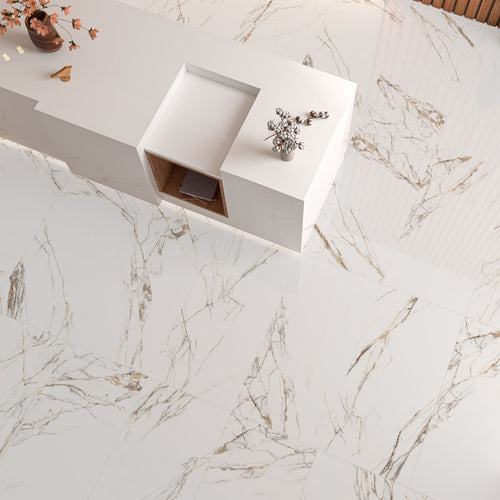 Top-down view of Ayora White Polished porcelain tiles laid on the floor with matching cladded walls, showcasing their glossy marble-effect finish.