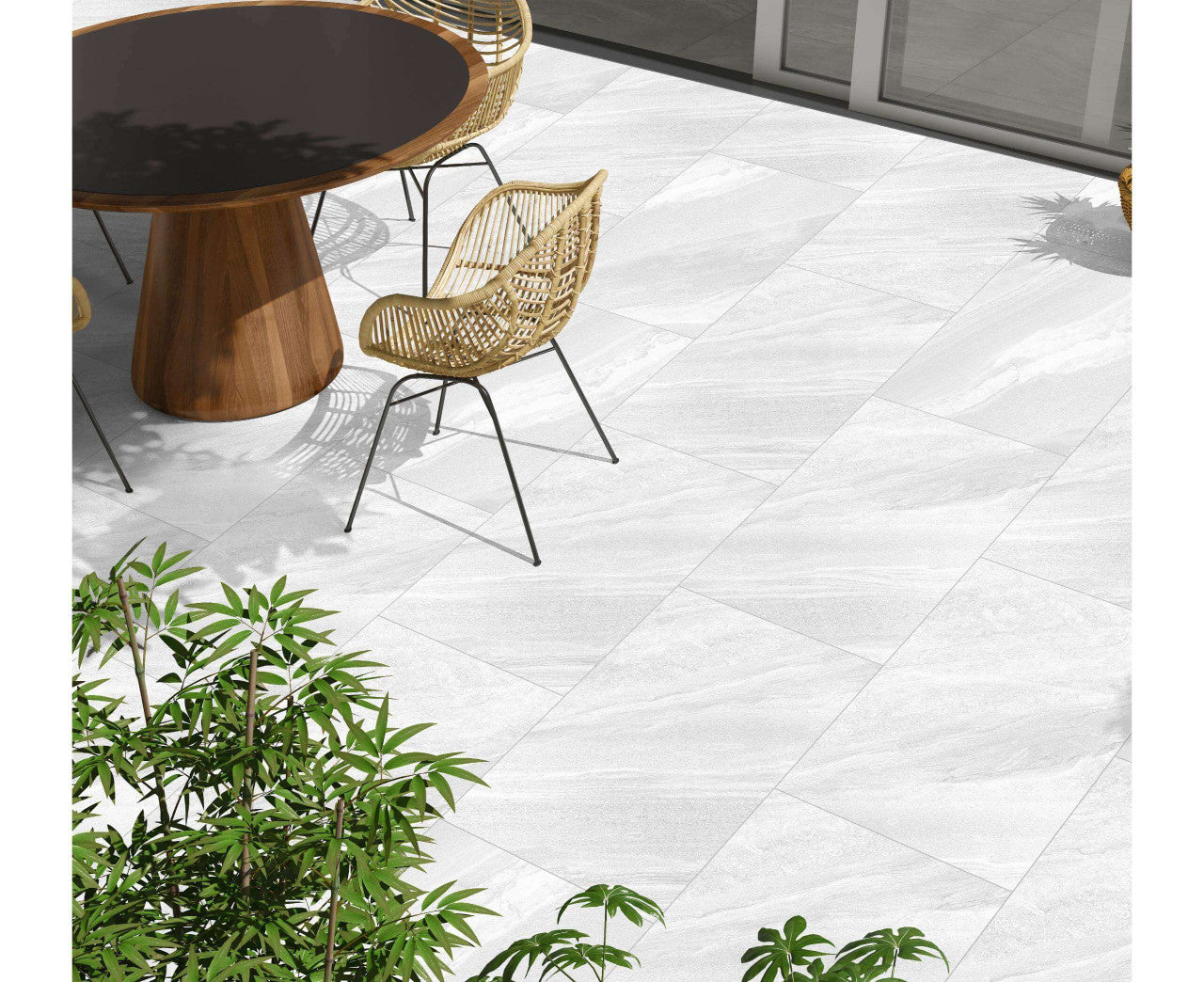 White porcelain paving slabs 900x600mm laid in garden setting