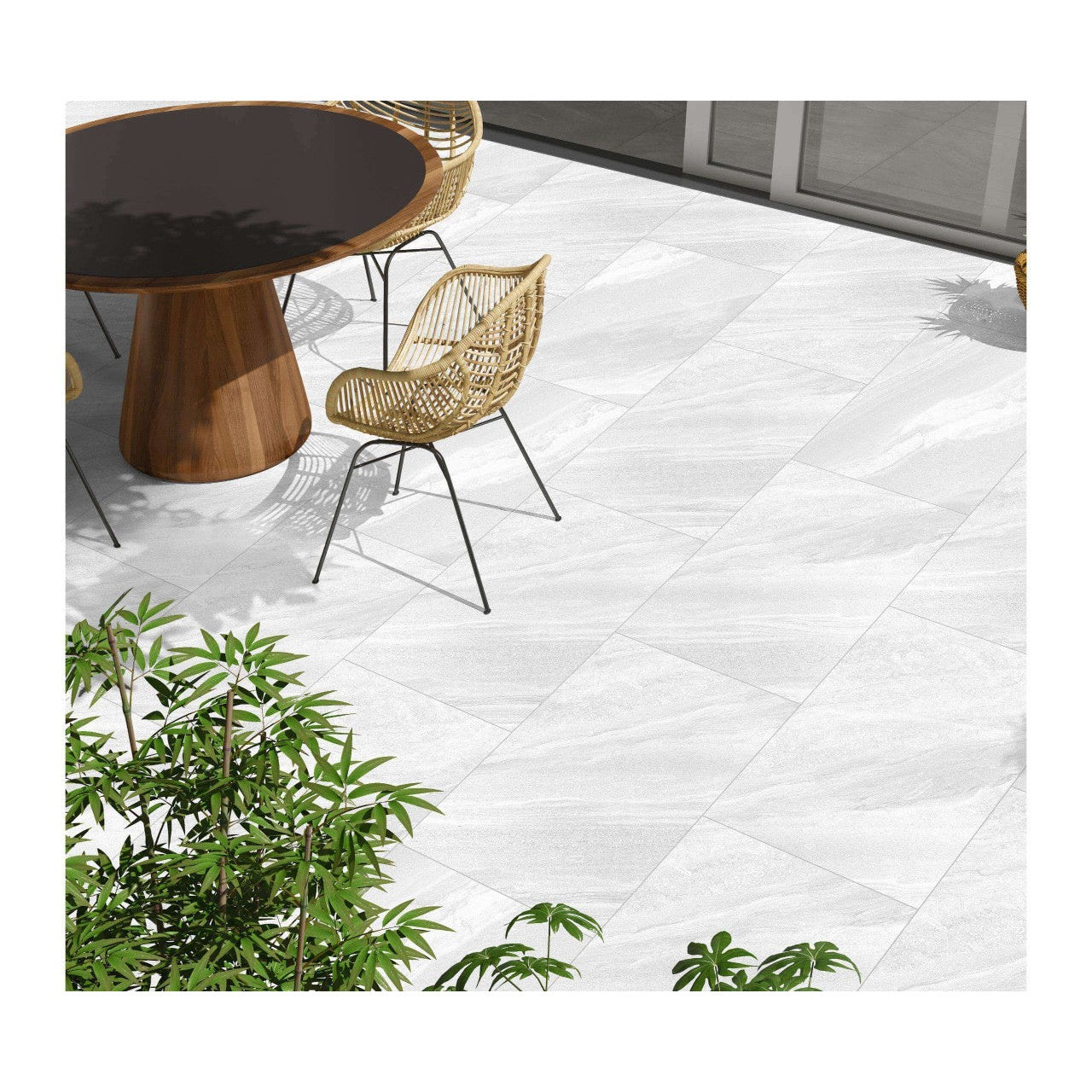 White porcelain paving slabs 900x600mm laid in garden setting
