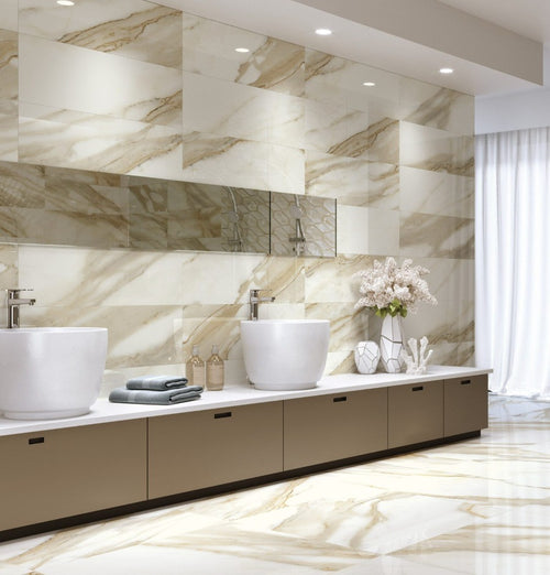 Calcatta Gold Polished Porcelain Tile 60x120cm used on bathroom walls and floors, creating a luxurious spa-like look with seamless finish.