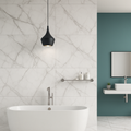 Bathroom design using Calva White Gloss Porcelain Tiles (60x120cm) on walls and floor – white marble effect finish with soft grey veining and glossy surface.