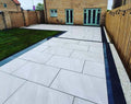 Crisp white crossover effect outdoor porcelain paving tiles 900x600mm on modern patio