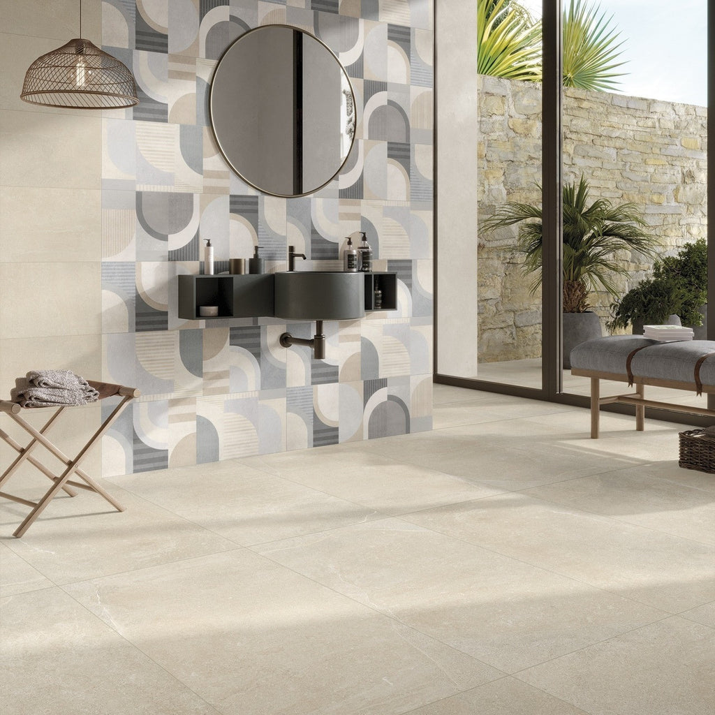 Modern bathroom interior with Earth Beige stone-effect porcelain tile used on floors and feature wall with geometric patterned accent tiles.