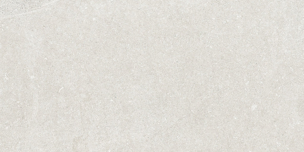 Flat lay of Earth White Tile showing its limestone-inspired texture and soft veining