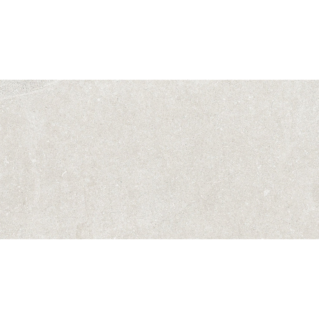 Flat lay of Earth White Tile showing its limestone-inspired texture and soft veining