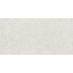 Flat lay of Earth White Tile showing its limestone-inspired texture and soft veining