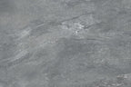 Close-up of Cloudstone mid grey stone effect porcelain paving surface texture 900x600mm