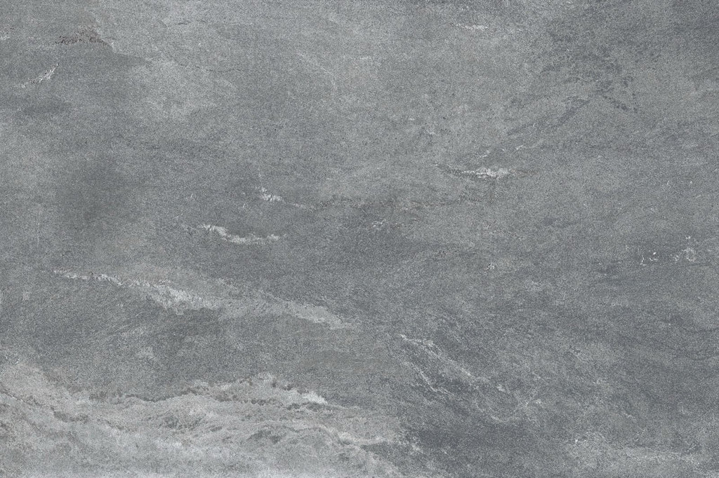 Mid grey porcelain paving tile face showing cloud-like tonal movement 900x600mm