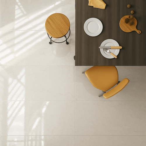 Elegant dining space featuring Eden Ivory Marble Gloss Tiles with a soft polished finish under natural light.