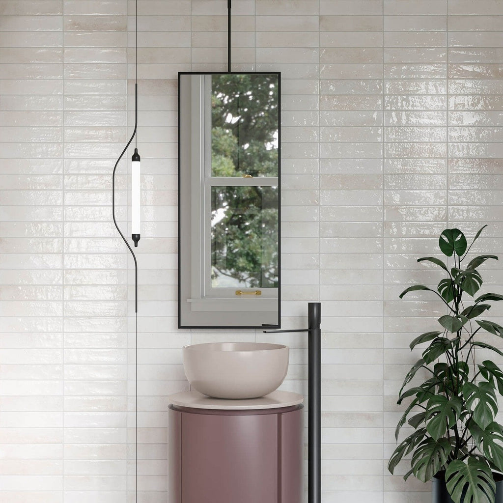 Modern bathroom featuring Edgy White Glossy Metro Wall Tiles in a stacked vertical layout with soft white tones and light-reflective finish.
