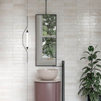 Modern bathroom featuring Edgy White Glossy Metro Wall Tiles in a stacked vertical layout with soft white tones and light-reflective finish.