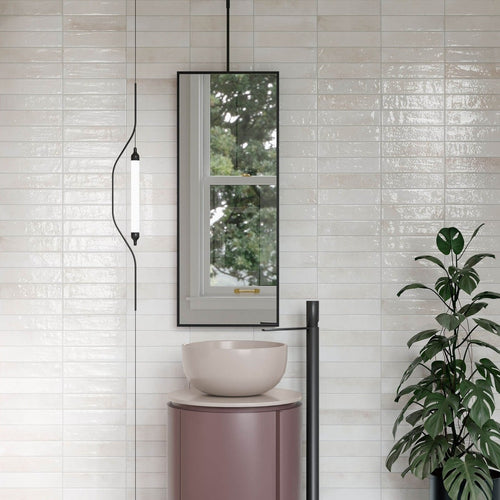 Modern bathroom featuring Edgy White Glossy Metro Wall Tiles in a stacked vertical layout with soft white tones and light-reflective finish.