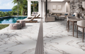 Elysian White 3D Matt Porcelain Tile 60x120cm used seamlessly across indoor lounge and outdoor poolside area, featuring subtle marble veining.