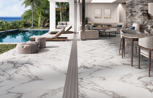 Elysian White 3D Matt Porcelain Tile 60x120cm used seamlessly across indoor lounge and outdoor poolside area, featuring subtle marble veining.