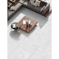 Crisp pearl white outdoor porcelain paving tiles 900x600mm in bright garden setting
