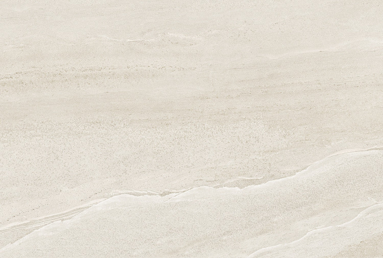 Close-up of Gravel White Outdoor Tile showing its layered stone-effect surface and natural matt texture.
