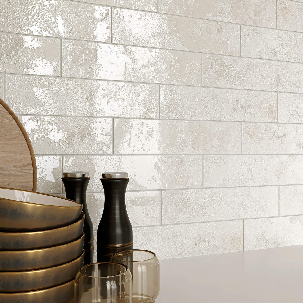 Studio image of Oceania White 6x25cm tile highlighting gloss finish and subtle texture.