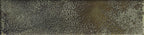 Zoomed-in image of Oceania Green tile showing unique crater effect in varied mossy green glaze.