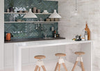 Modern kitchen interior with Urban Blue Glossy Metro Tiles in a herringbone pattern, used as a stylish splashback with contrasting white cabinetry.