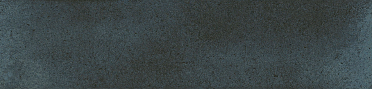 Close-up of Urban Blue Glossy Metro Tile showing subtle texture, petrol-blue colour and reflective glazed surface.
