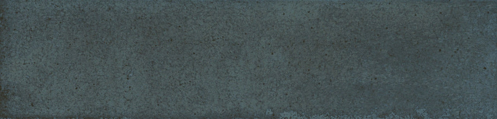 Detailed tile image of Urban Blue Glossy Metro Wall Tile with handcrafted finish and tonal variation in dark blue.