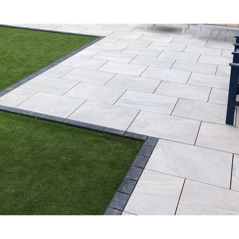 Premium pearl outdoor porcelain paving tiles 900x600mm in elegant garden setting