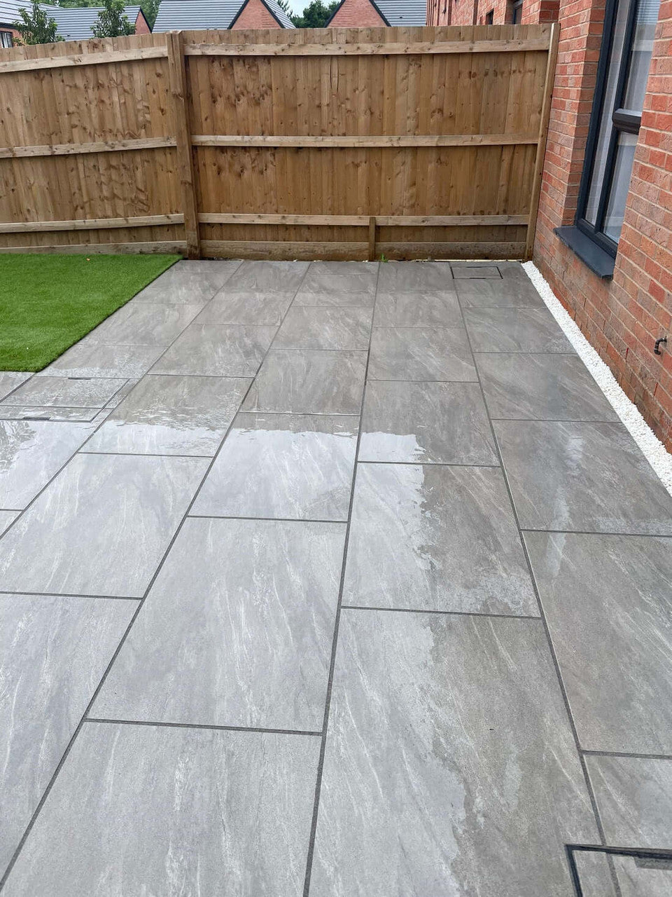 Light anthracite contemporary outdoor porcelain paving tiles 900x600mm on modern patio