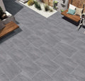 Light ash stone effect outdoor porcelain paving tiles 900x600mm in garden setting