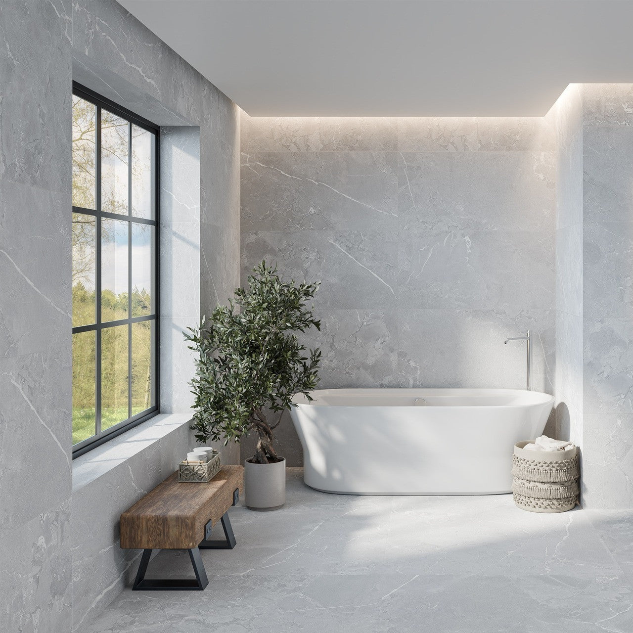 Modern bathroom featuring Lithos Grey Stone-effect tiles on walls and floors with natural light flooding through a black-framed window.