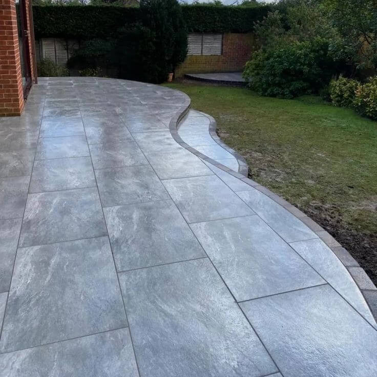 Classic London grey outdoor porcelain paving tiles 900x600mm on contemporary patio