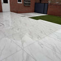 Marble effect grey outdoor porcelain paving tiles 900x600mm on luxury patio