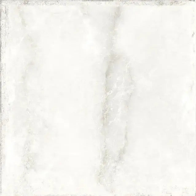 Single Noble White Matt 20x20cm tile close-up, highlighting its textured surface and aged edges.