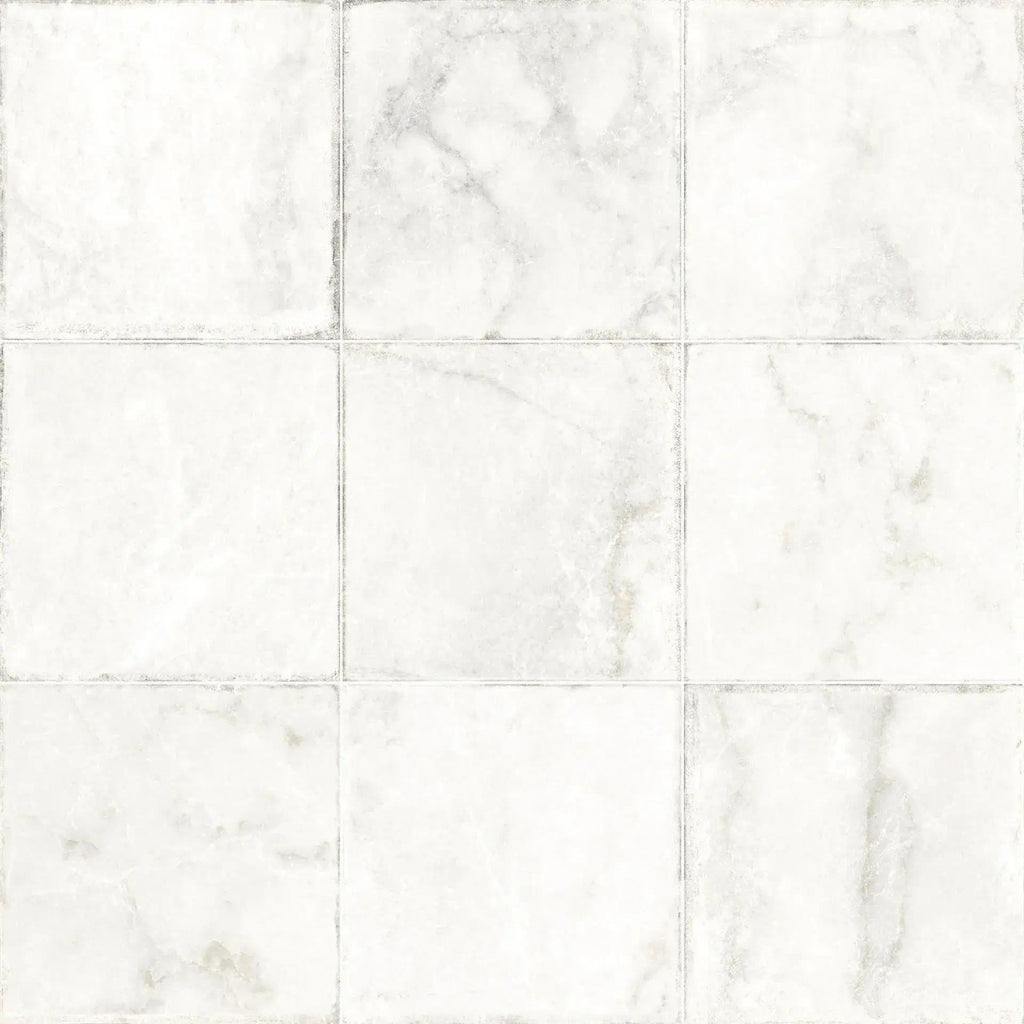 Overhead view of Noble White tiles arranged in a grid layout, showing their natural variation and stone-effect detailing.