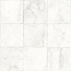 Overhead view of Noble White tiles arranged in a grid layout, showing their natural variation and stone-effect detailing.