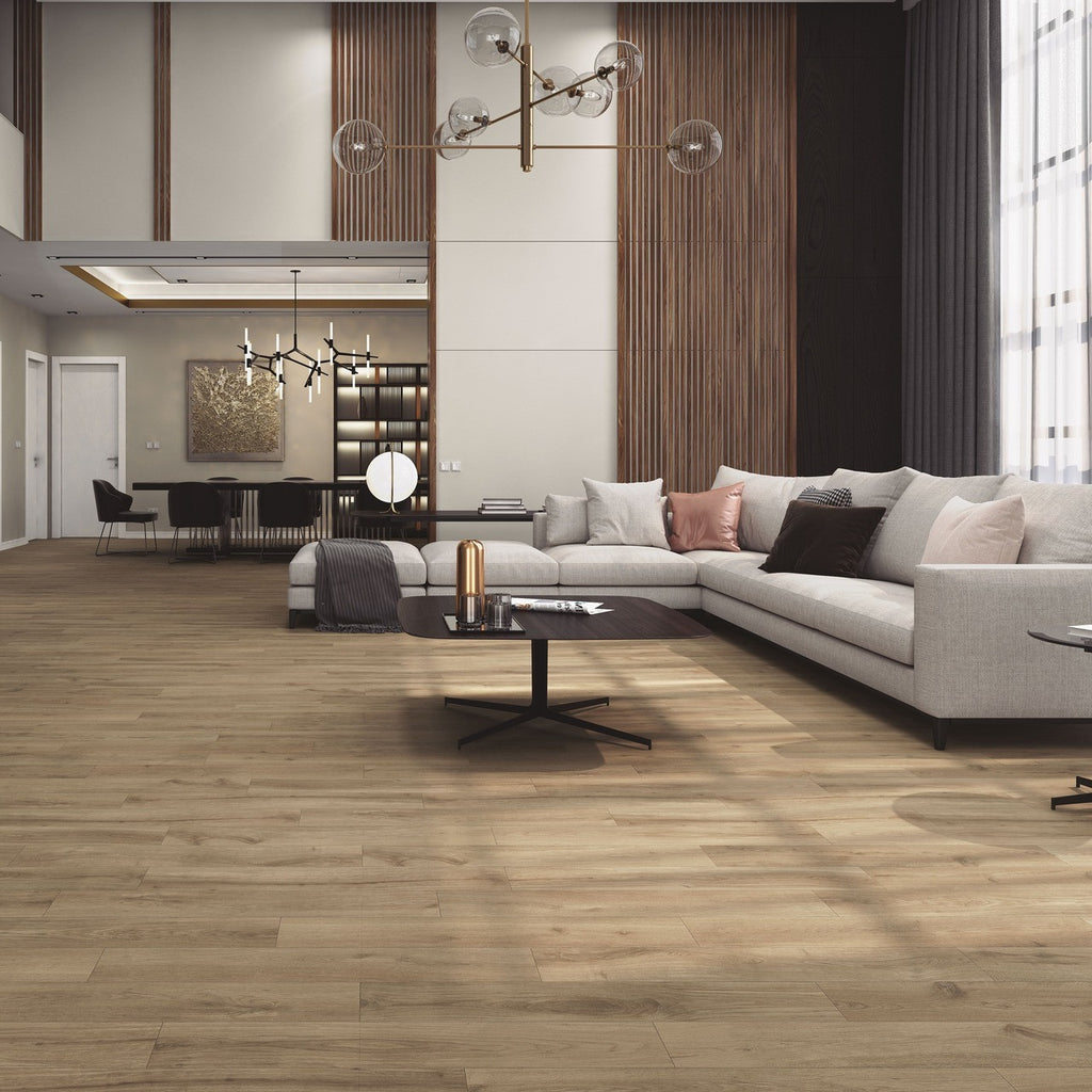 Living area with Oakmere Pine wood-effect tiles laid in a staggered plank format, offering a natural timber aesthetic.