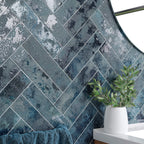 Close-up of Oceania Blue Textured Metro Wall Tile 6cm x 25cm showing glossy textured finish and herringbone pattern