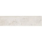 Glossy white body tile with light-reflecting finish and gently rippled surface texture.
