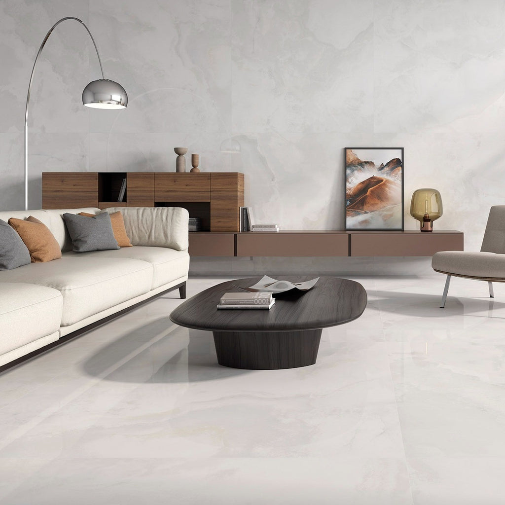 Elegant Lounge Design with Opal White Tiles – Contemporary room featuring a floating sideboard, neutral sofa, and super polished Opal White wall and floor tiles.