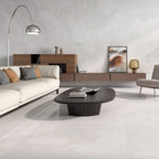 Elegant Lounge Design with Opal White Tiles – Contemporary room featuring a floating sideboard, neutral sofa, and super polished Opal White wall and floor tiles.