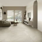 Modern living room with Pietra Ivory stone-effect floor tiles and neutral décor