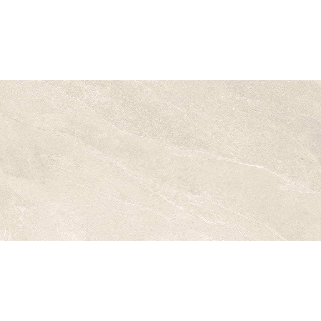 Close-up of Pietra Ivory porcelain tile showing natural stone-like texture and warm Ivory tones