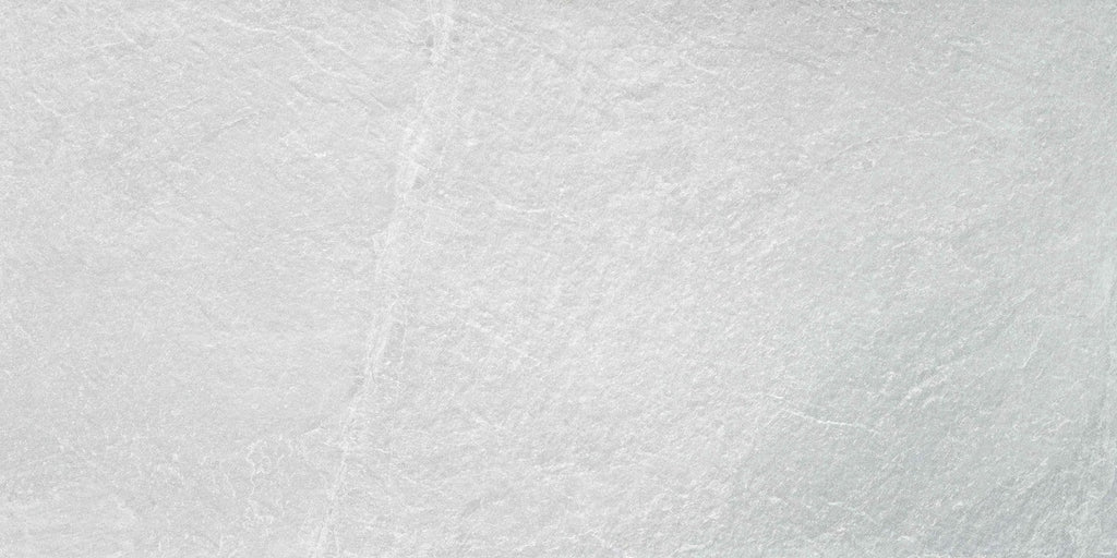 Detailed close-up of Quarry White tile surface showing soft white texture and stone-like detailing.